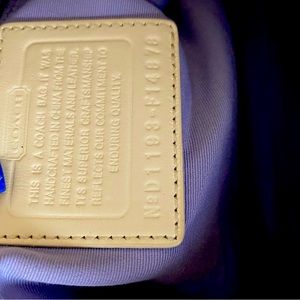 Coach handbag brown/ white w purple lining